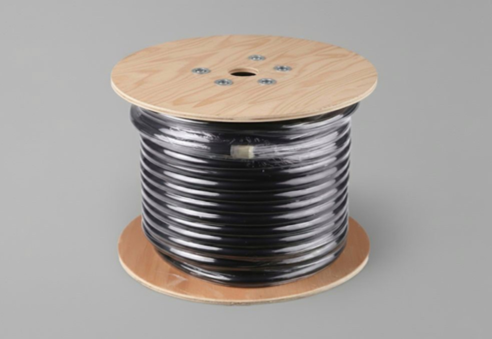 A spool of black industrial cable.